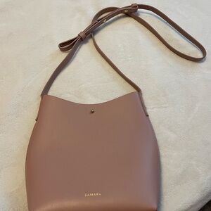 Samara like new pink cross body purse